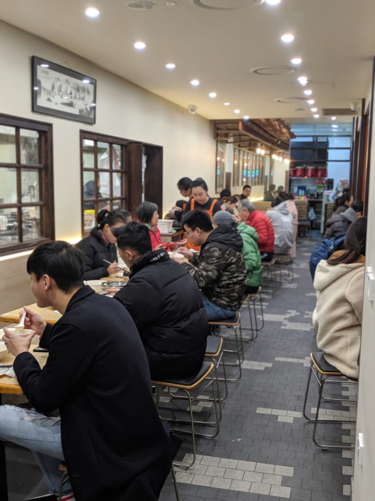 People eating at Mother Chu's Taiwanese Gourmet